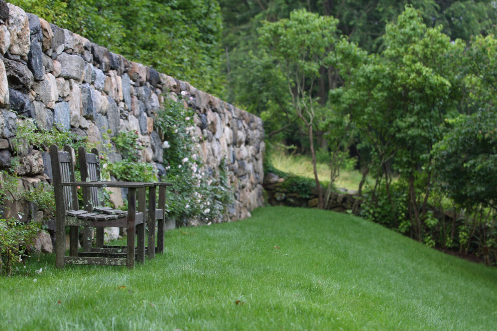 Inspiration for a traditional back garden wall in Other.