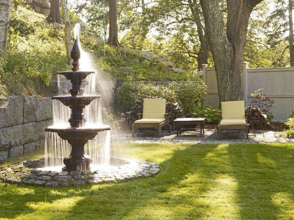 Photo of a classic garden in Boston with a water feature.