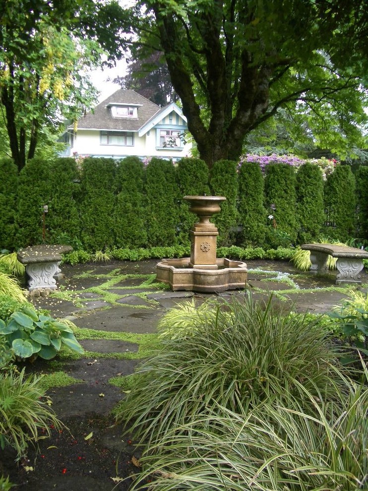 Design ideas for a traditional water fountain landscape in Vancouver.