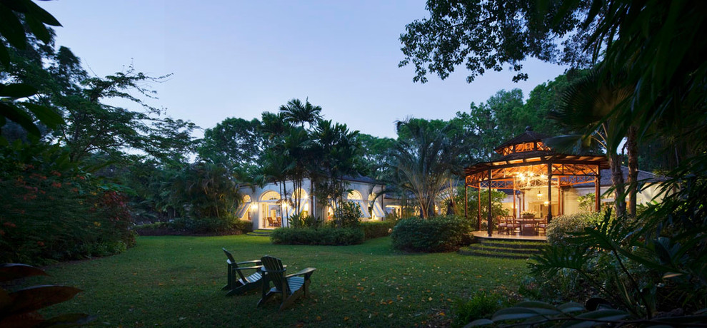 This is an example of a tropical backyard landscaping in New York.