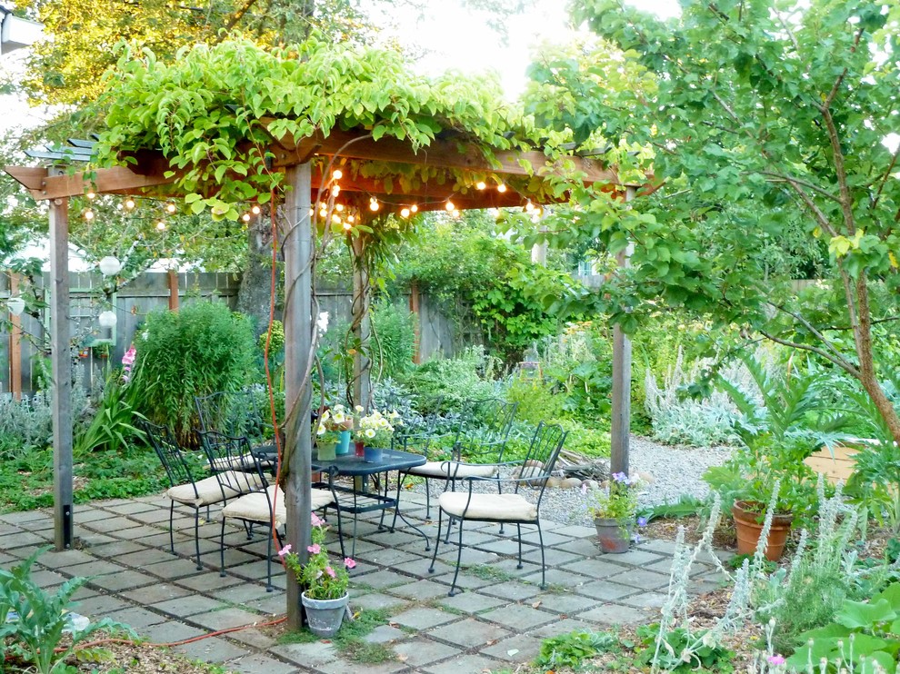 Medium sized country full sun garden in Portland with mulch.