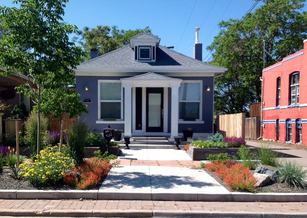 Esempio di un piccolo giardino xeriscape stile americano davanti casa con graniglia di granito