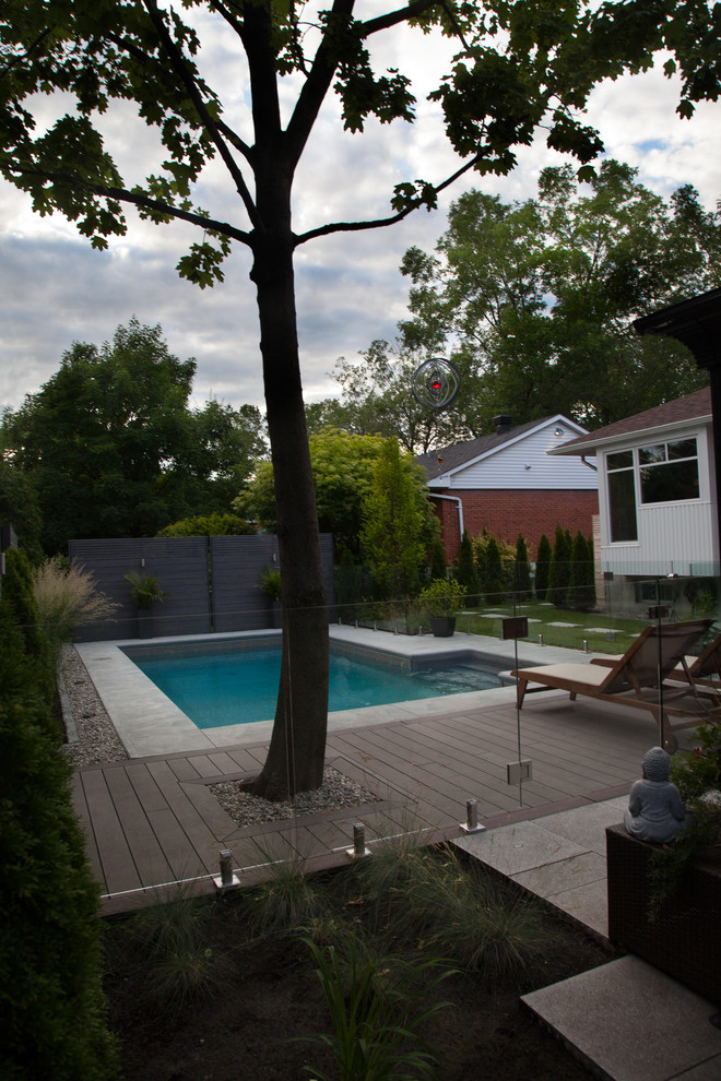 Inspiration for a contemporary full sun backyard concrete paver outdoor sport court in Montreal for summer.