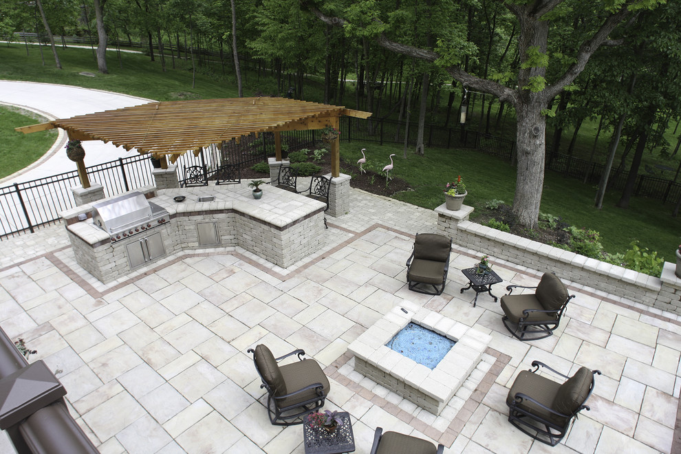 This is an example of a mediterranean patio in Milwaukee.