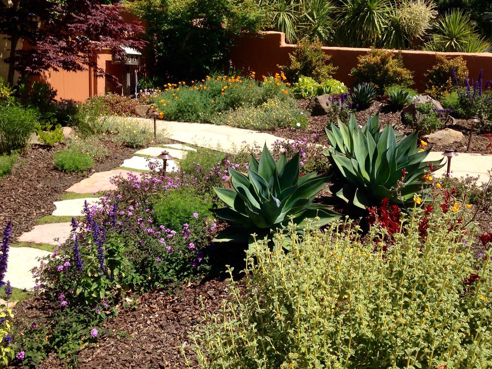Design ideas for a small eclectic drought-tolerant and full sun front yard stone garden path in San Francisco for summer.
