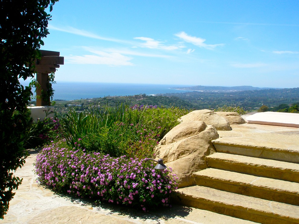 Inspiration for a large mediterranean back xeriscape full sun garden in Santa Barbara.