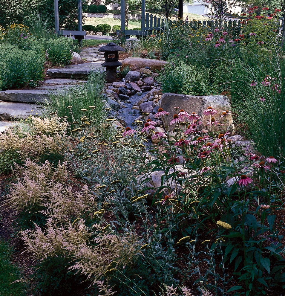 Inspiration for a medium sized rustic back garden in Detroit with a garden path and natural stone paving.
