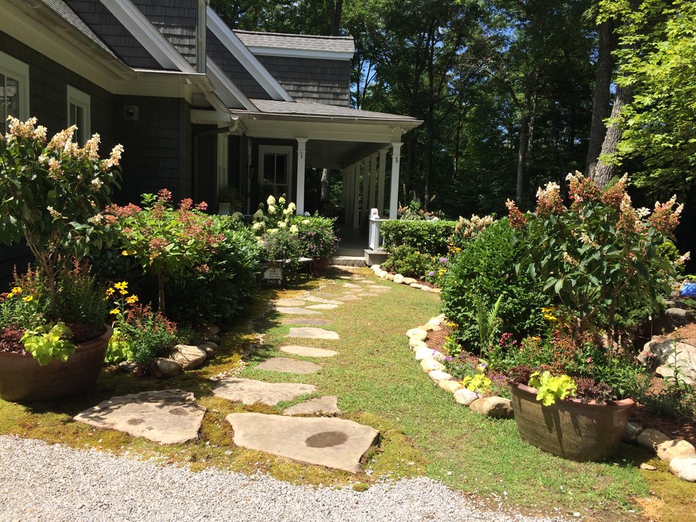Inspiration for a small traditional full sun stone garden path in Other for summer.