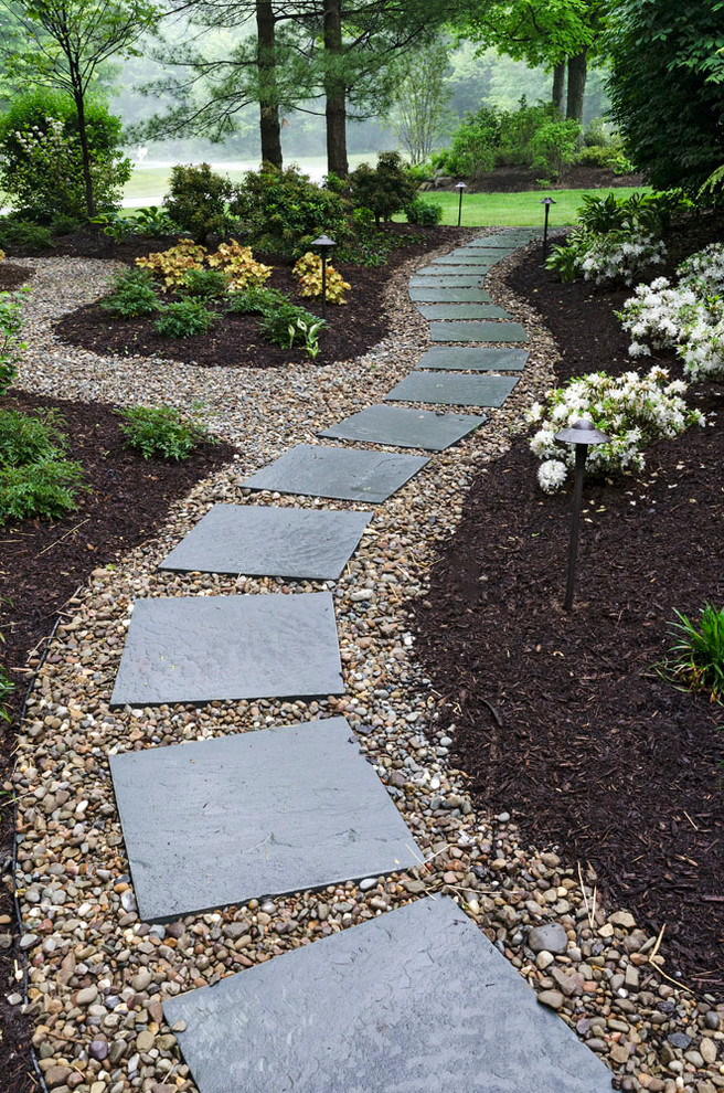 Inspiration for a medium sized classic back fully shaded garden in Cleveland with a garden path and natural stone paving.