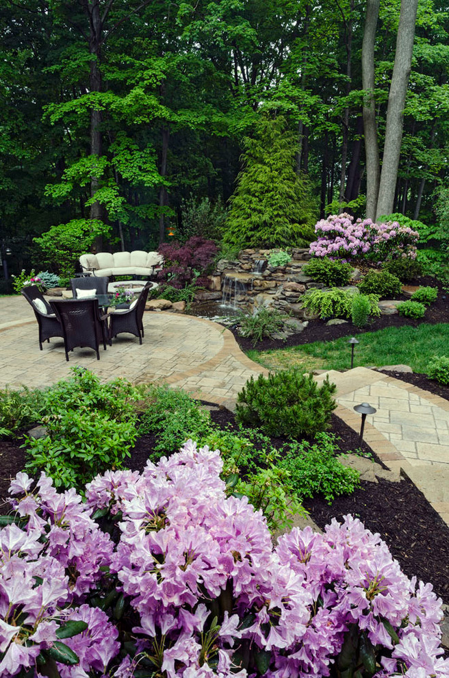 Design ideas for a huge traditional partial sun backyard garden path in Cleveland for spring.