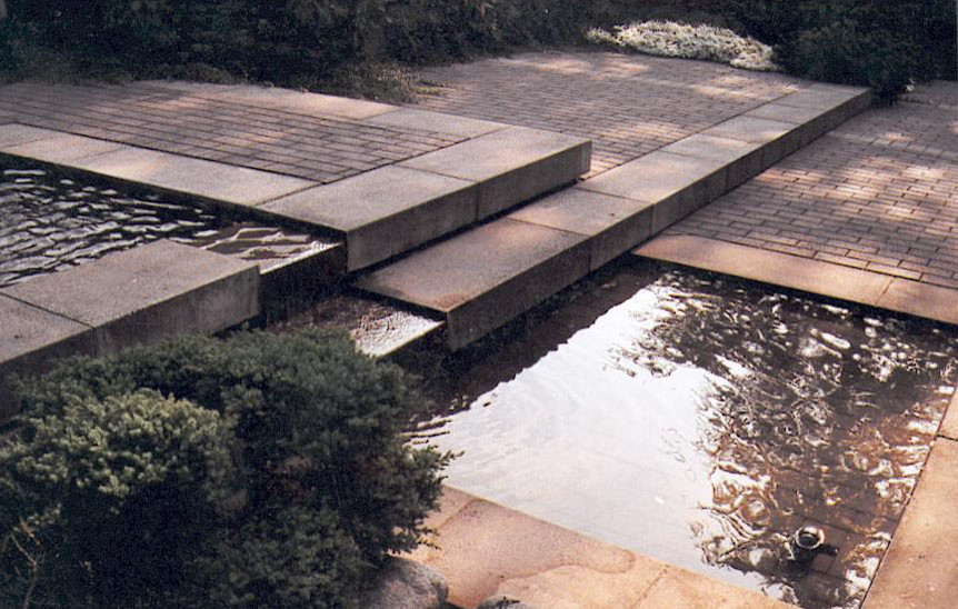 Design ideas for a modern garden in Vancouver with concrete paving.