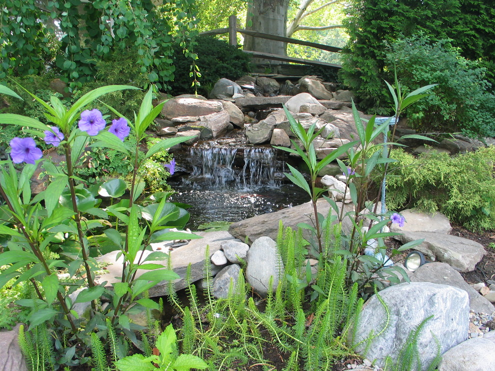 Photo of a classic garden in Philadelphia with a water feature.