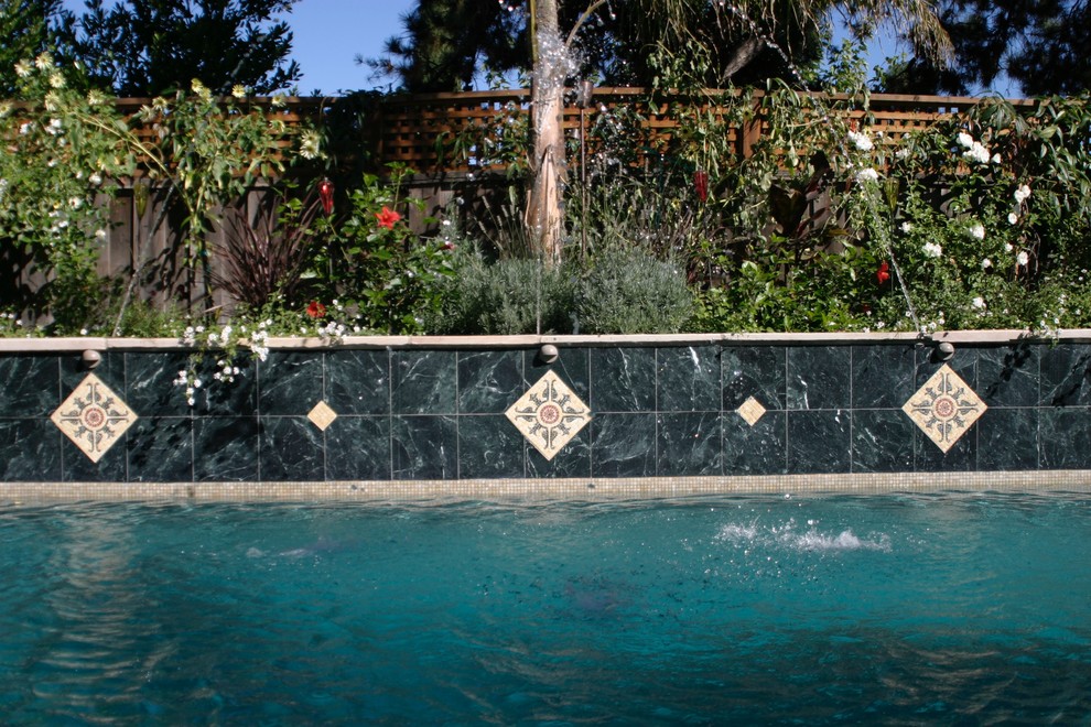 This is an example of a small mediterranean back garden in San Francisco.