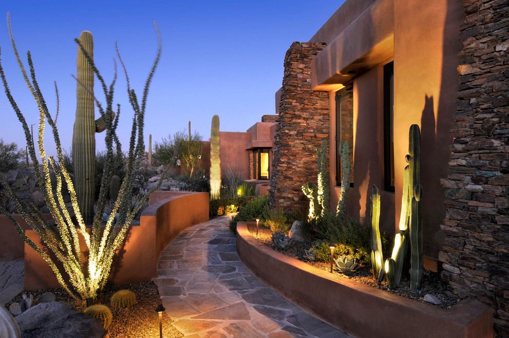 Diseño de jardín de secano de estilo americano en patio delantero con adoquines de piedra natural