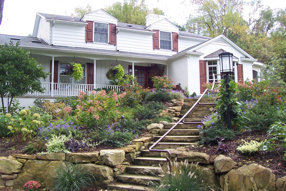Design ideas for a large traditional full sun front yard stone garden path in Cleveland for summer.