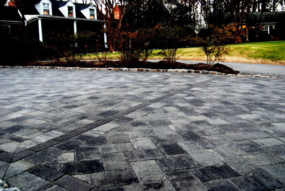 Photo of a medium sized classic front driveway full sun garden for summer in Richmond with brick paving.
