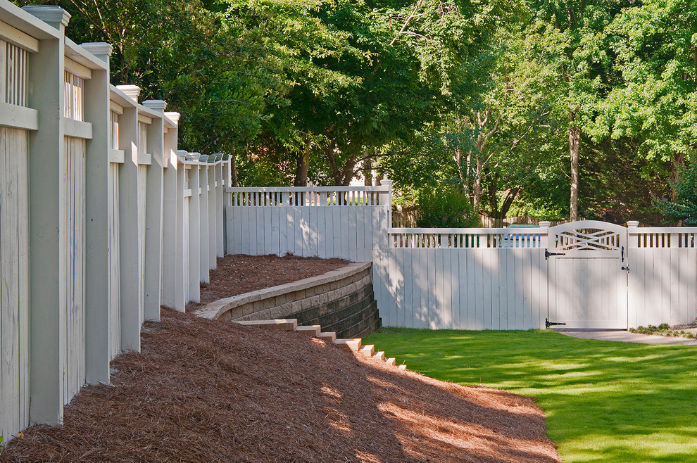 Design ideas for a transitional backyard landscaping in Atlanta.