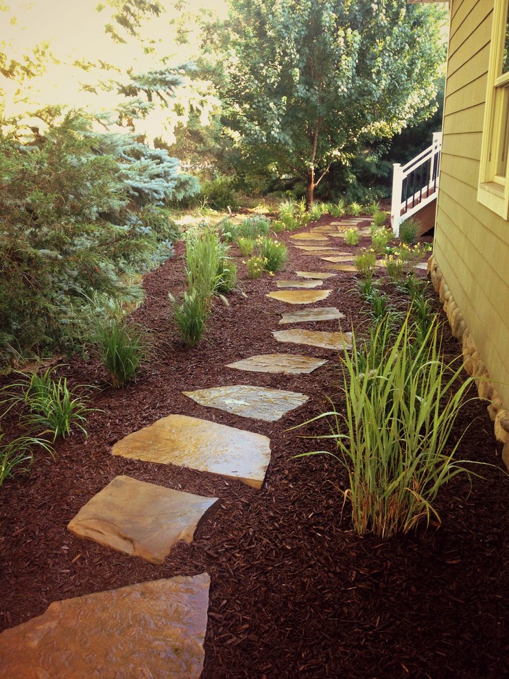 Photo of a small coastal partial sun side yard stone garden path in Other for summer.