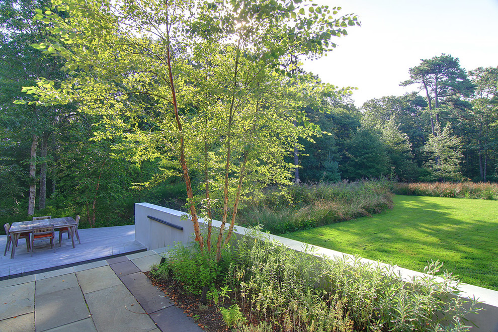 Inspiration for a contemporary back formal fully shaded garden for summer in Providence with natural stone paving.