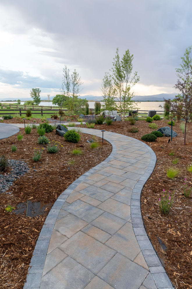 Design ideas for a huge craftsman full sun side yard mulch garden path in Denver.