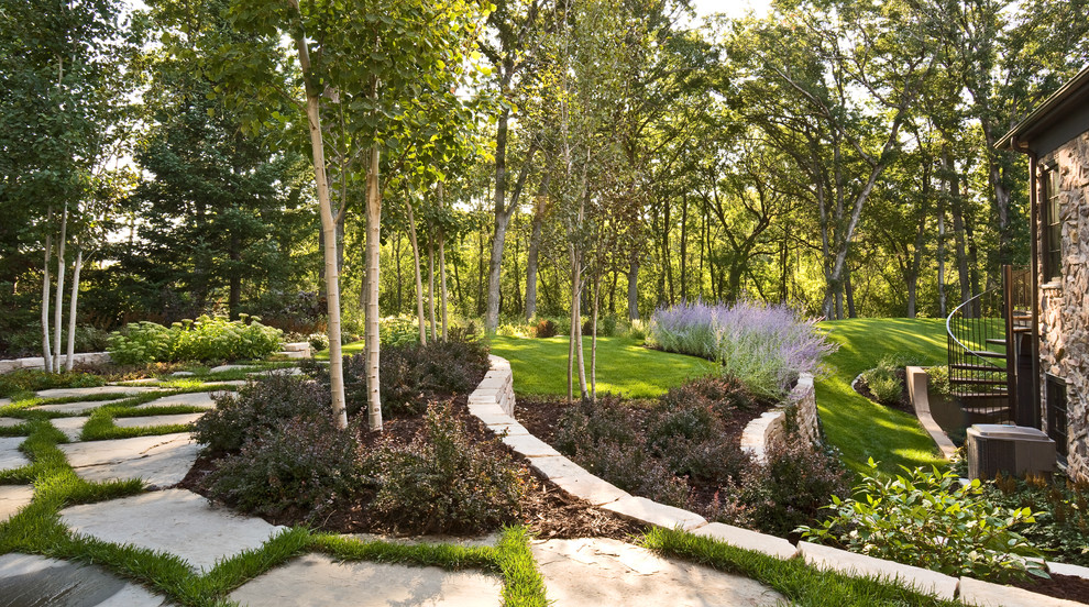 Design ideas for a contemporary retaining wall landscape in Minneapolis.