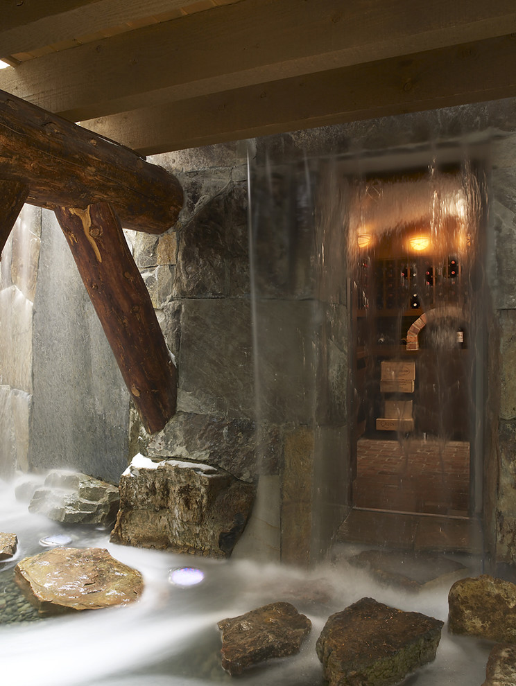This is an example of a rustic stone water fountain landscape in Minneapolis.