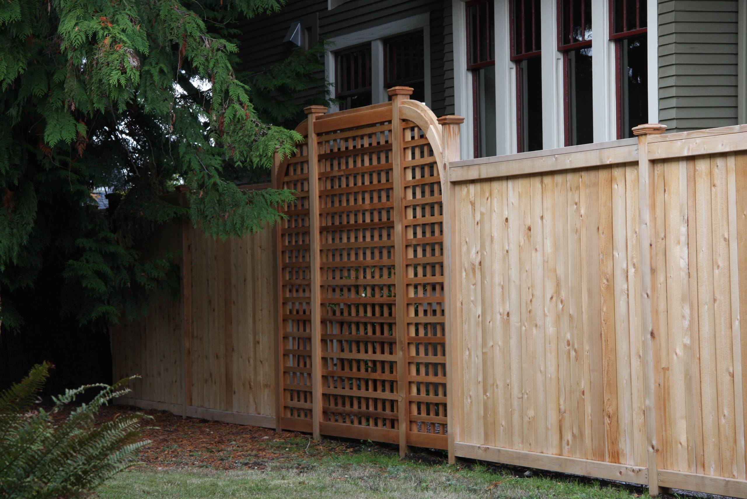 Cedar gate with square lattice topper - Lions Fence