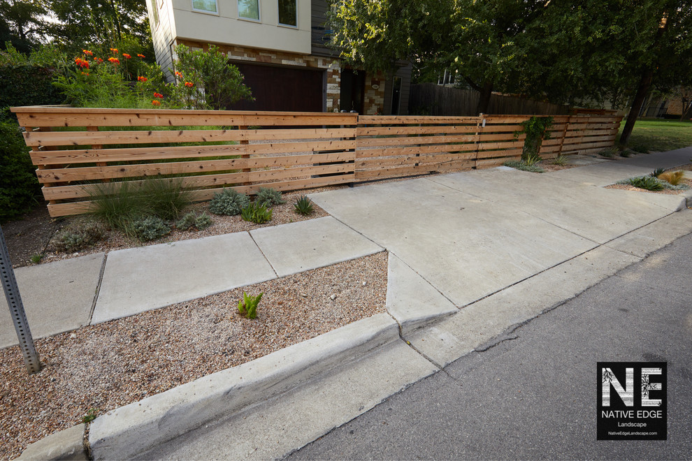 Photo of a mid-sized shabby-chic style drought-tolerant and partial sun front yard gravel garden path in Austin.