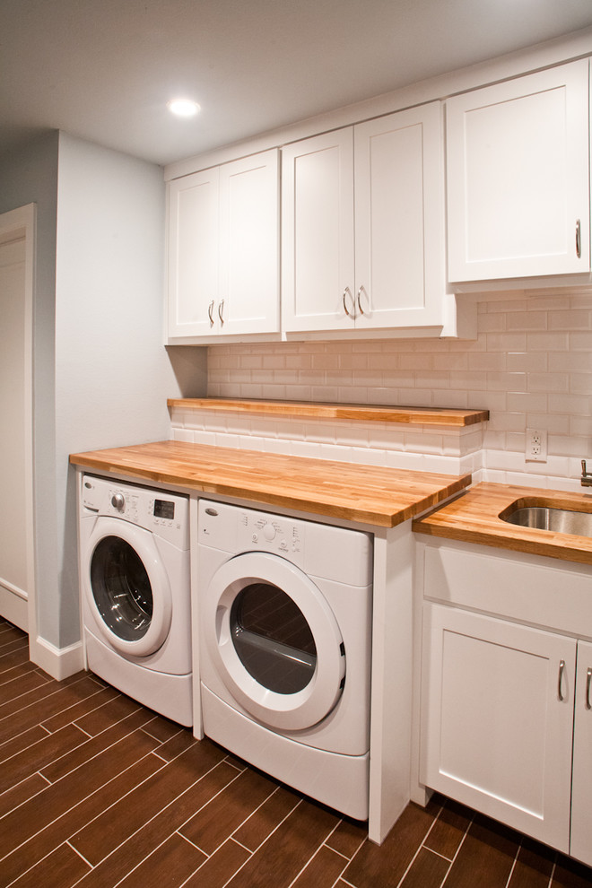 Photo of a traditional utility room in Dallas.