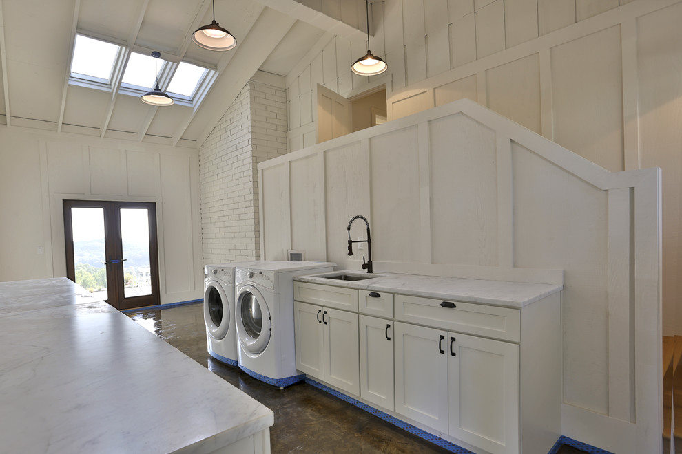 Design ideas for a medium sized country galley utility room in San Francisco with a built-in sink, white cabinets, granite worktops, white walls, ceramic flooring, a side by side washer and dryer and shaker cabinets.