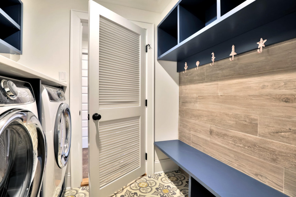 Photo of a beach style utility room in New York.