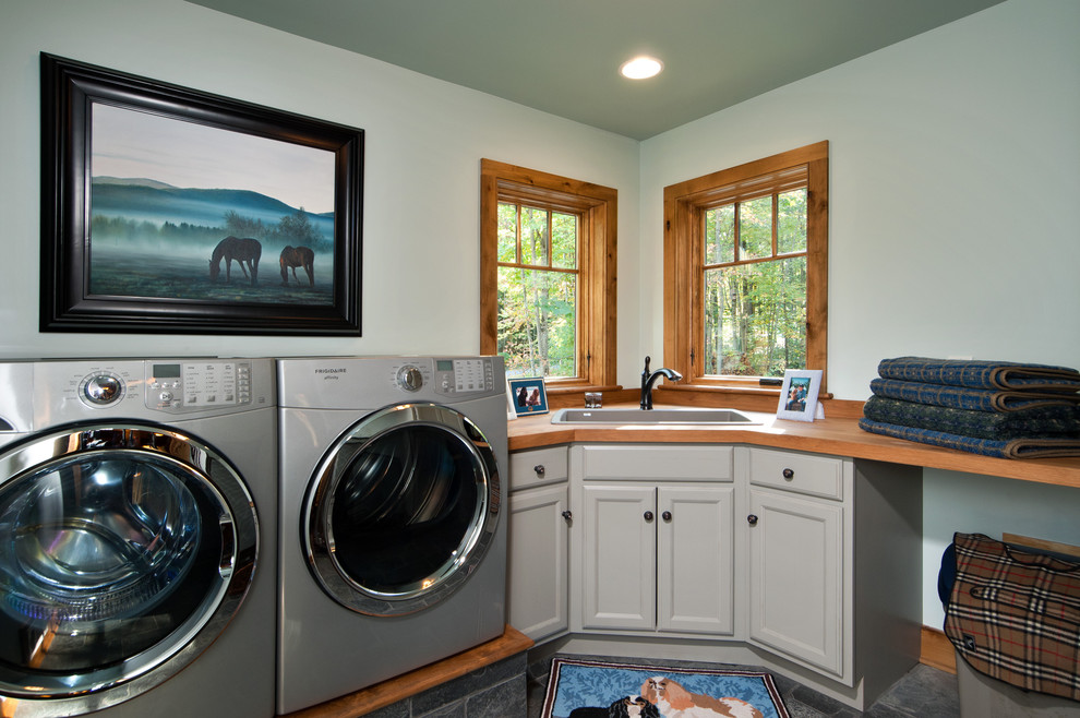 Example of a trendy laundry room design in New York