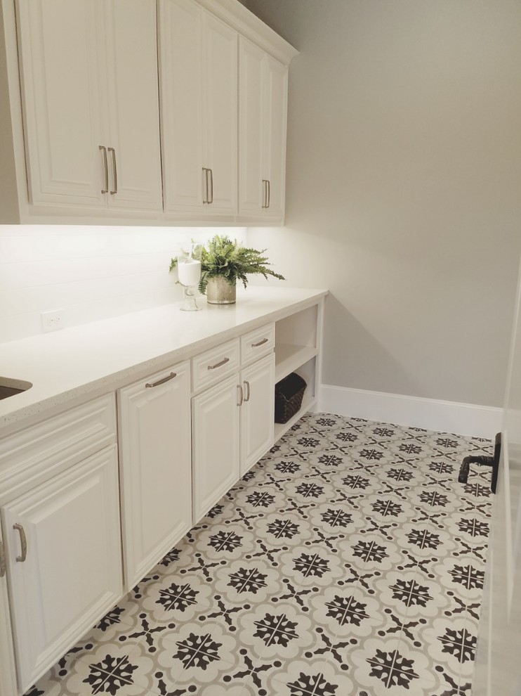 Inspiration for a classic utility room in Dallas with engineered stone countertops.
