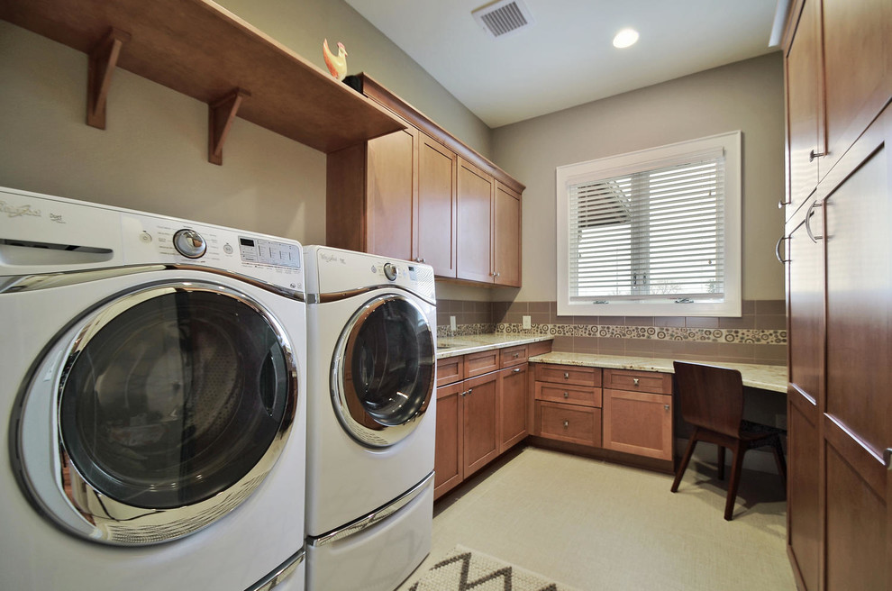 Design ideas for a medium sized classic u-shaped utility room in Austin with a submerged sink, shaker cabinets, medium wood cabinets, granite worktops, beige walls, porcelain flooring and a side by side washer and dryer.