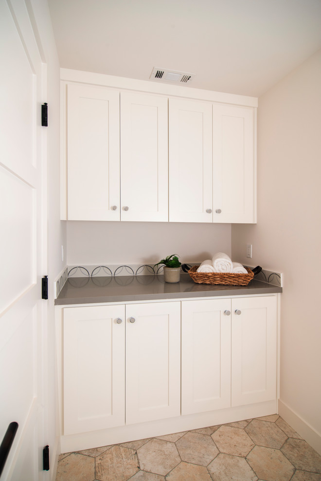 Design ideas for a classic utility room in San Francisco with shaker cabinets and white cabinets.