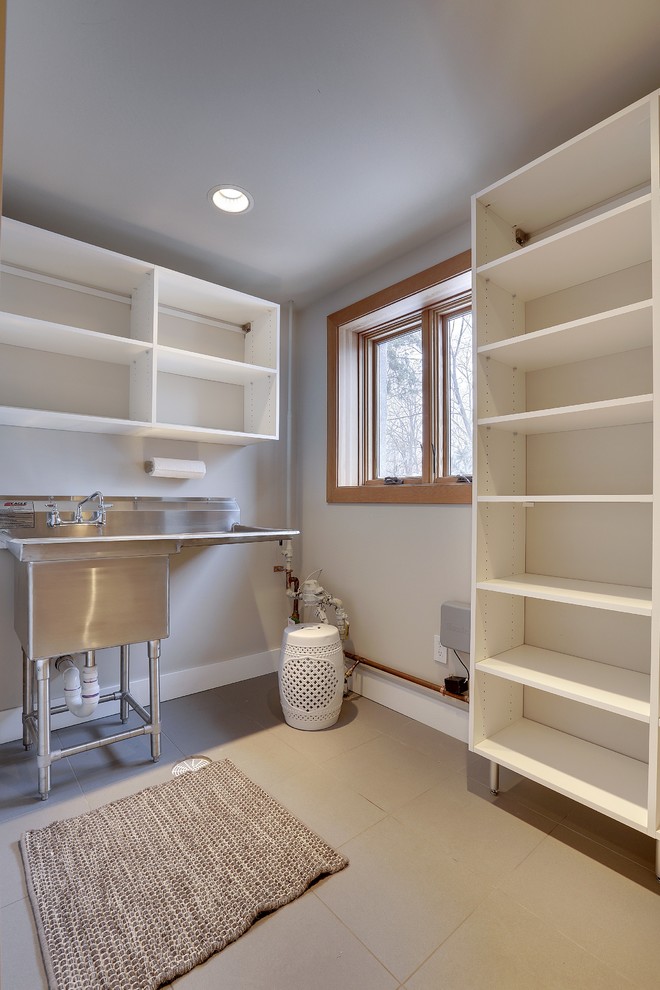 Example of a mountain style laundry room design in Minneapolis