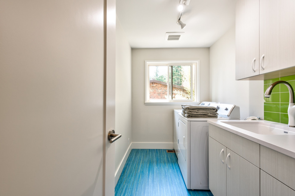 Example of a 1950s laundry room design in Seattle