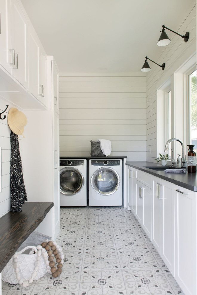 Design ideas for a traditional utility room in Jacksonville with open cabinets, white cabinets, engineered stone countertops, white walls, ceramic flooring, a side by side washer and dryer and grey worktops.