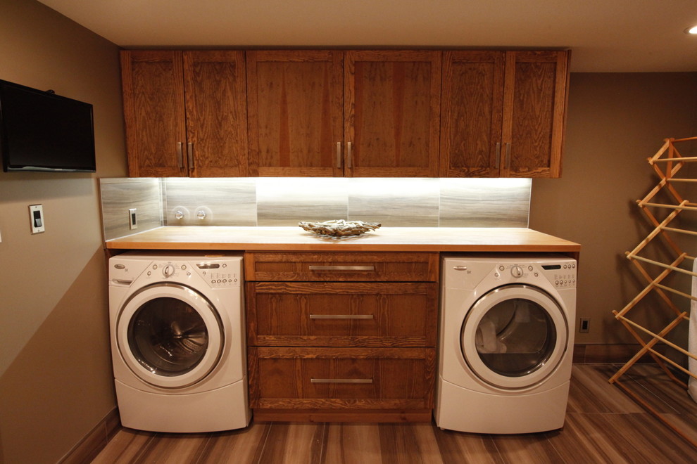 Inspiration for a modern laundry room remodel in Edmonton