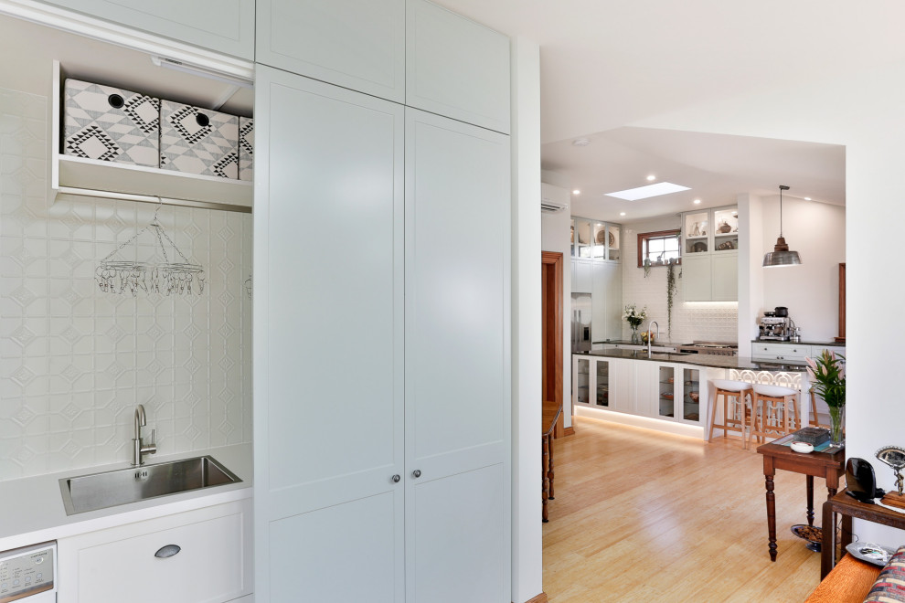 Inspiration for a timeless laundry room remodel in Christchurch