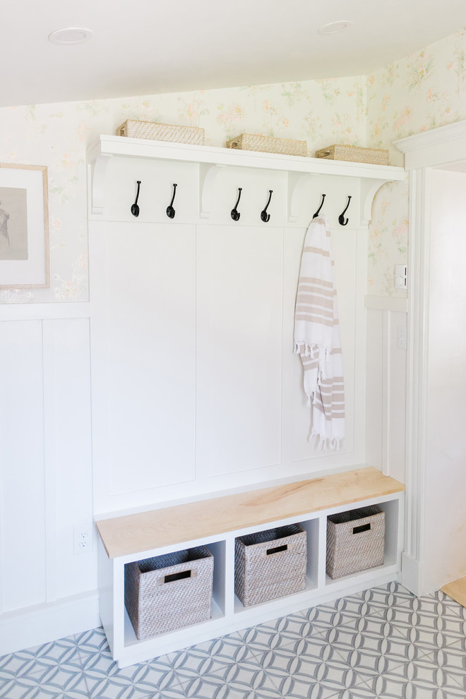 Photo of a shabby-chic style utility room in Boston with marble flooring.