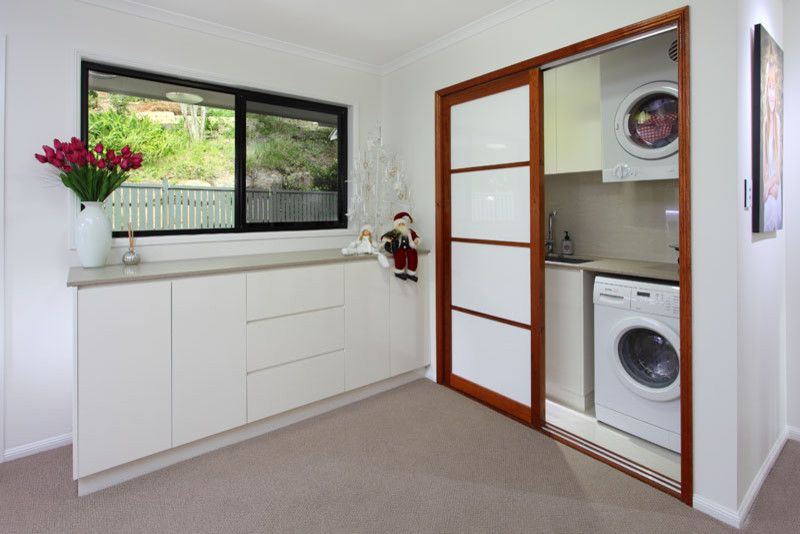 Inspiration for a modern utility room in Brisbane.
