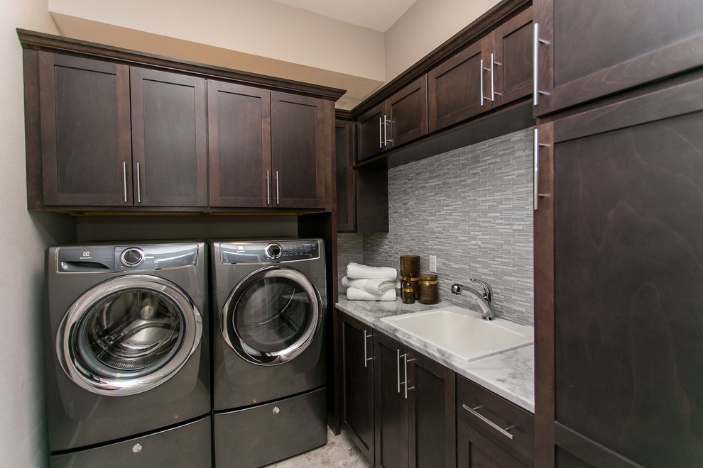 Laundry room - transitional laundry room idea in Seattle