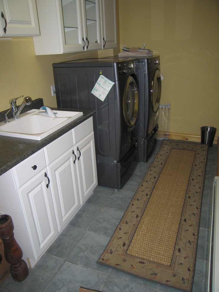 Inspiration for a rustic laundry room remodel in Denver