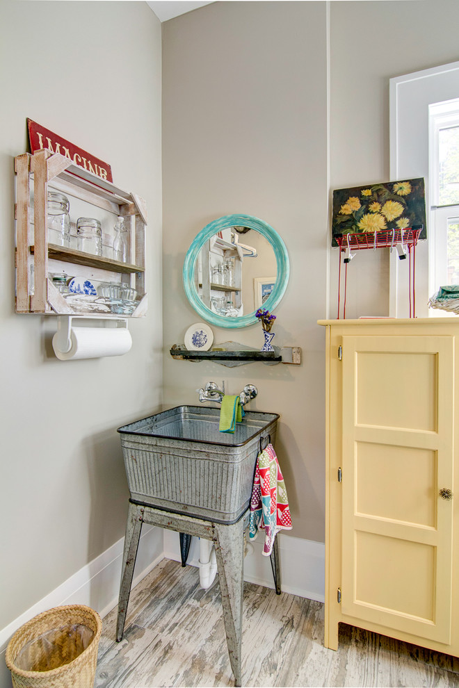 This is an example of a shabby-chic style utility room in Jacksonville.