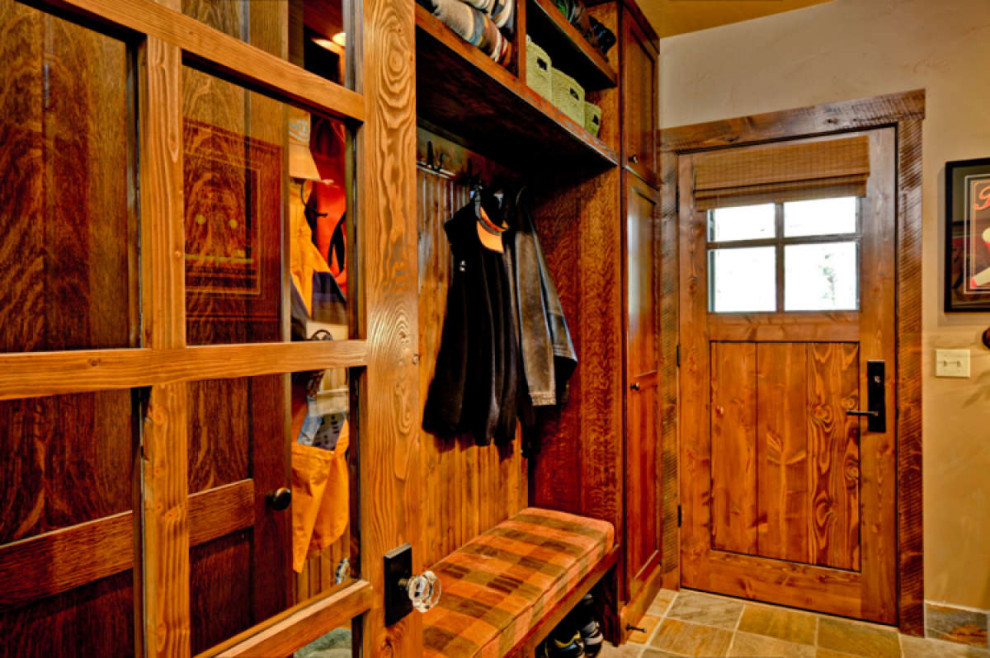 Example of a mountain style laundry room design in Atlanta