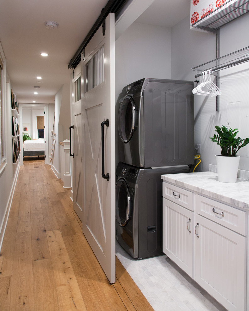 Beach style laundry room photo in Orange County