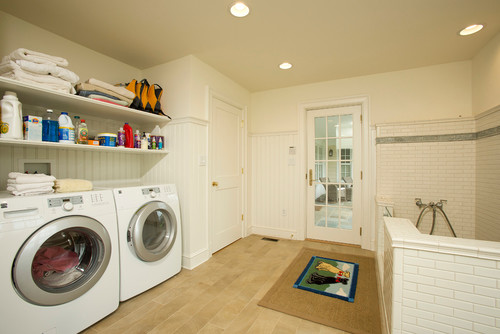 All white laundry room with dog wash