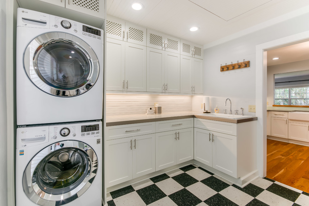 Inspiration for a coastal laundry room remodel in Other