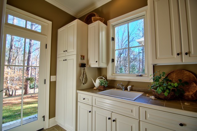 Inspiration for a farmhouse laundry room remodel in Raleigh